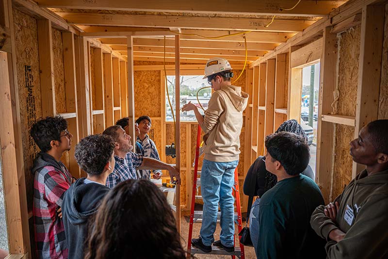 Students in Wunsche HS Construction Management Pathway Building Tiny House