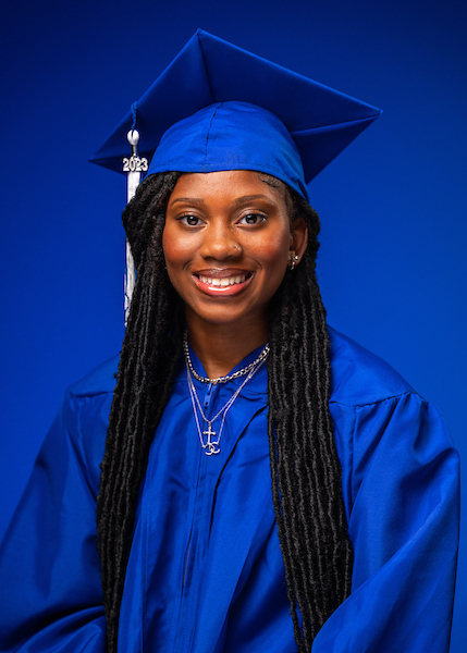 Decorated graduation caps denote pride in family, education in El Paso