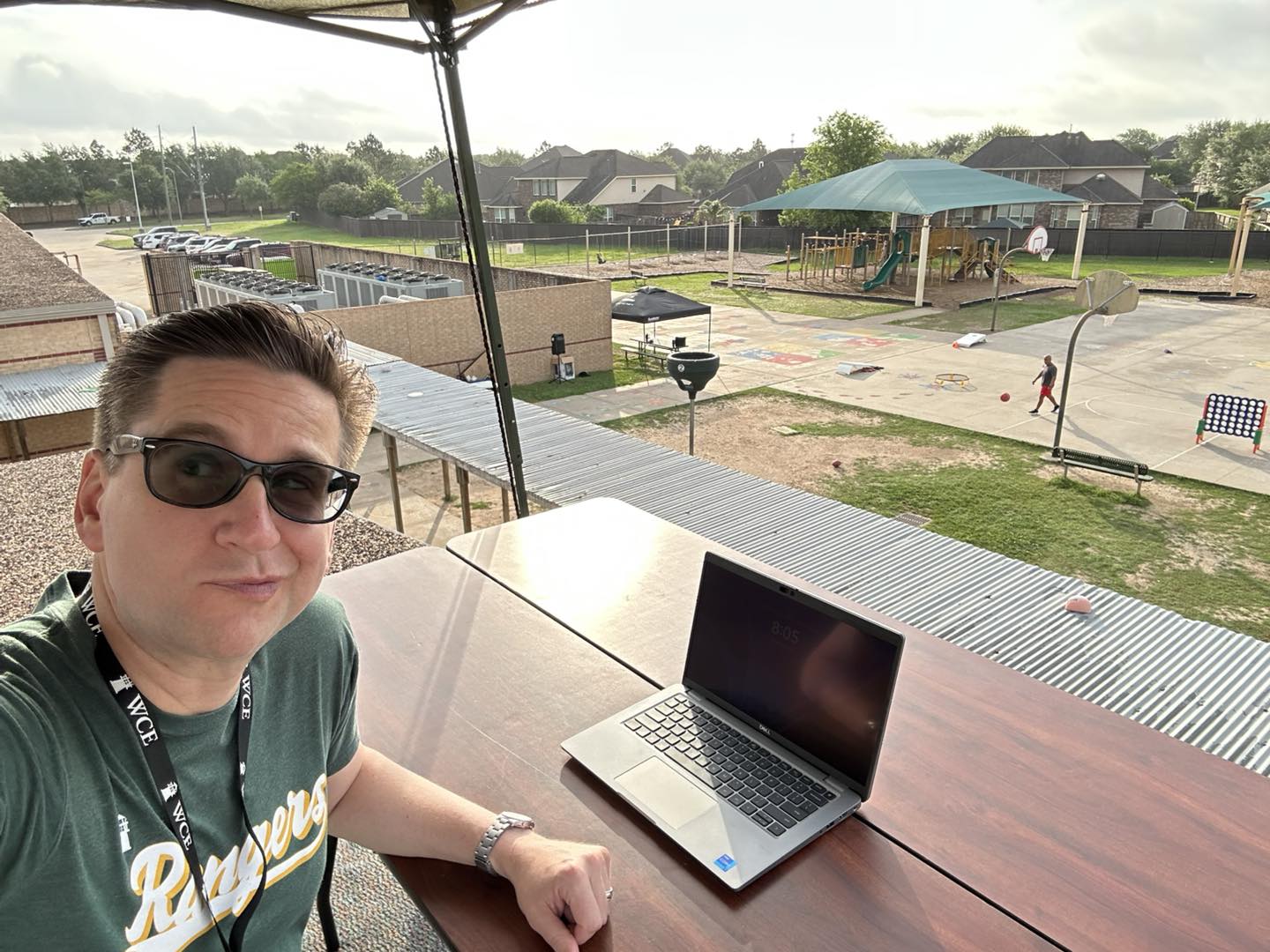 WoodCreek Elementary Principal Works from the Roof to Celebrate $81K Fundraiser Success