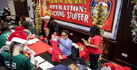 Houston Fire Department Kicks off In-Store Shopping for Operation Stocking Stuffer
